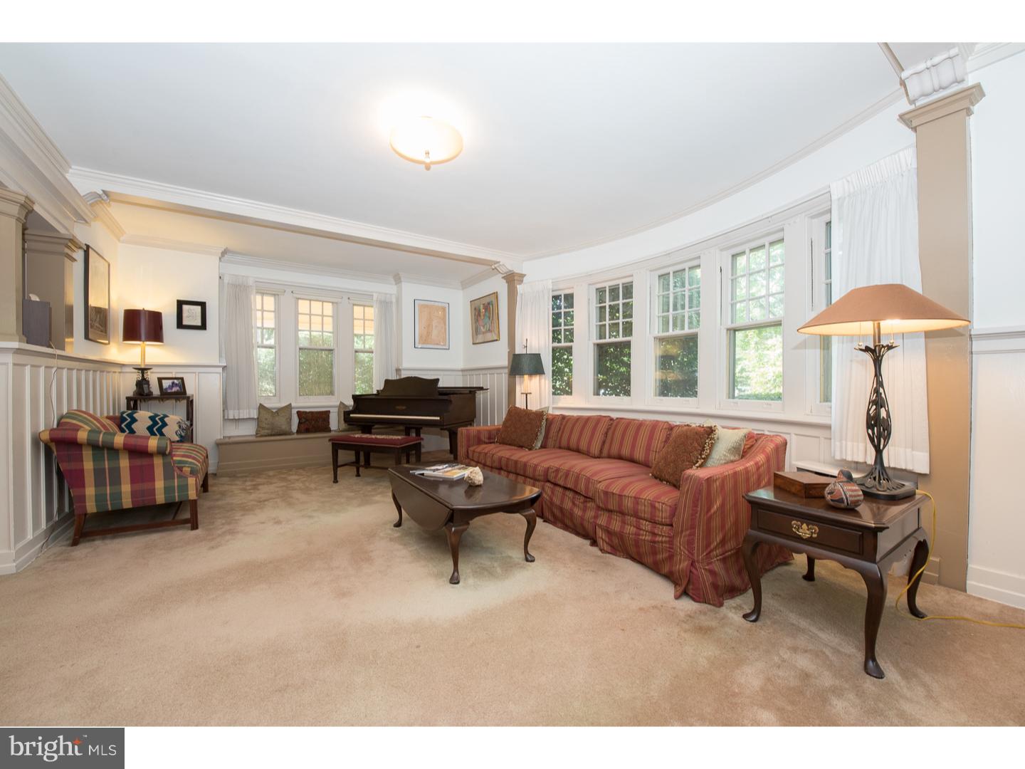 540 Manor Road Wynnewood, PA 19096 - Photo 7 of 25 a living room with furniture and a large window