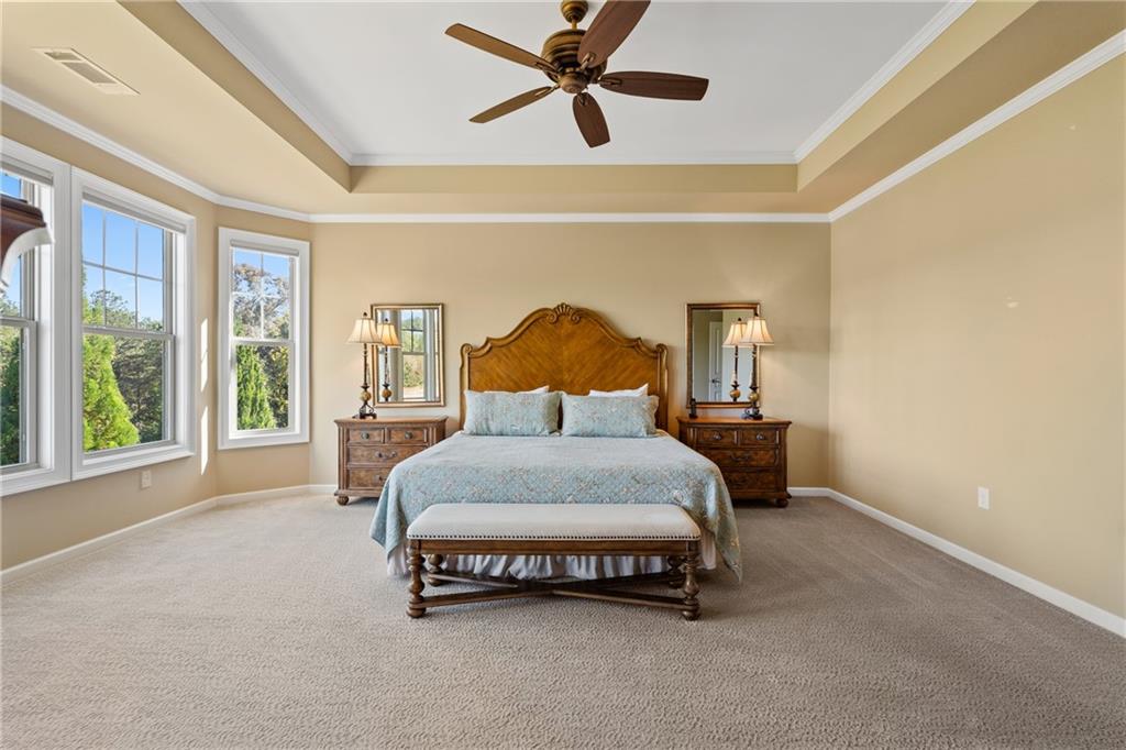 319 Laurel Lookout Hills Canton, GA 30114 - Photo 27 of 80 a spacious bedroom with a bed and large window