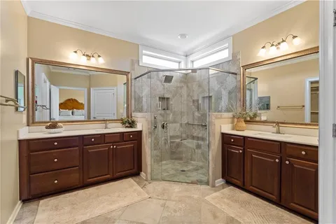 a view of storage and utility room with a refrigerator