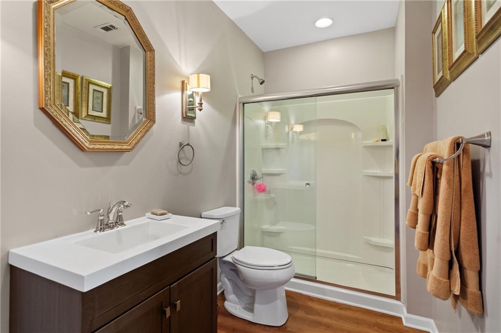 319 Laurel Lookout Hills Canton, GA 30114 - Photo 38 of 80 a bathroom with a sink toilet and shower
