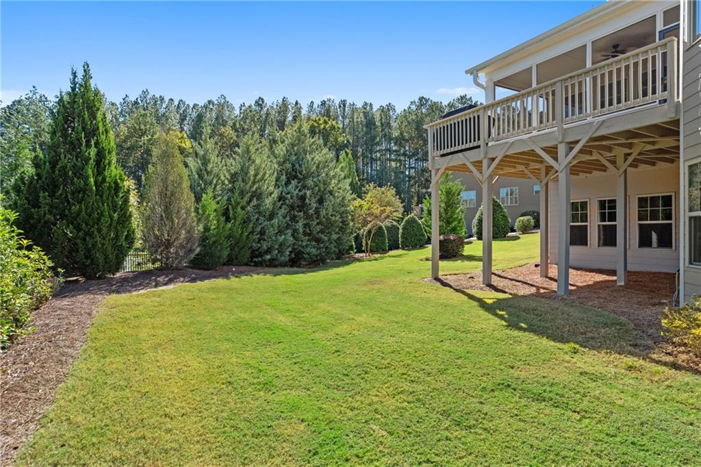 319 Laurel Lookout Hills Canton, GA 30114 - Photo 52 of 80 a view of a house with a yard