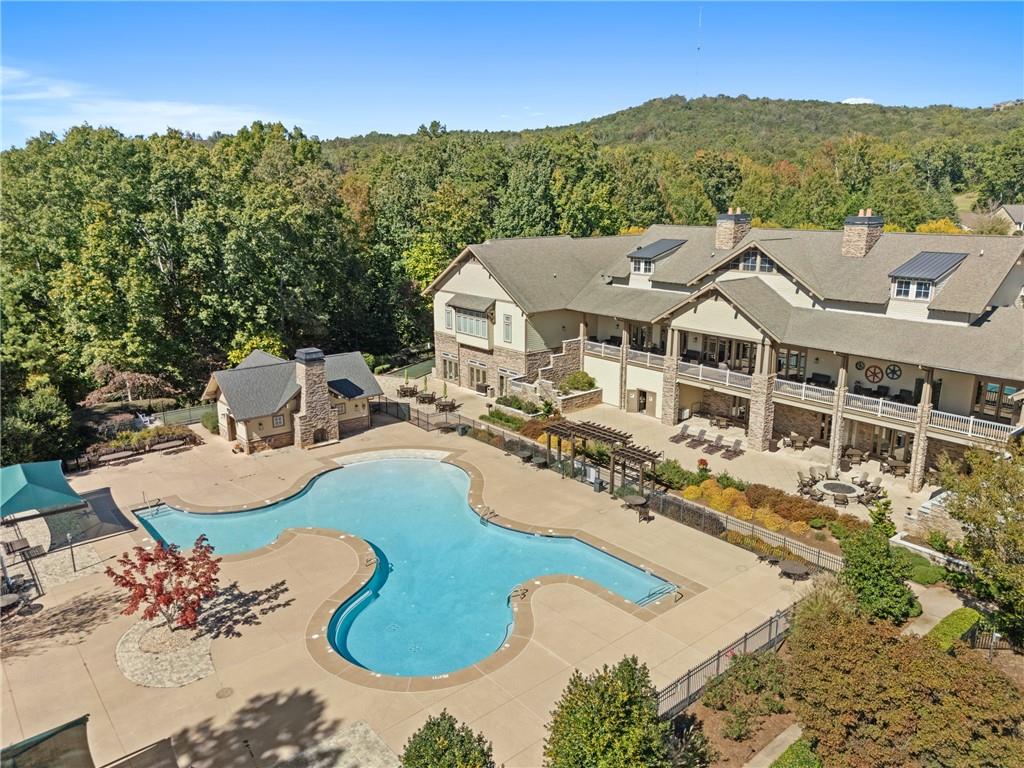 319 Laurel Lookout Hills Canton, GA 30114 - Photo 71 of 80 a view of a house with pool and a yard