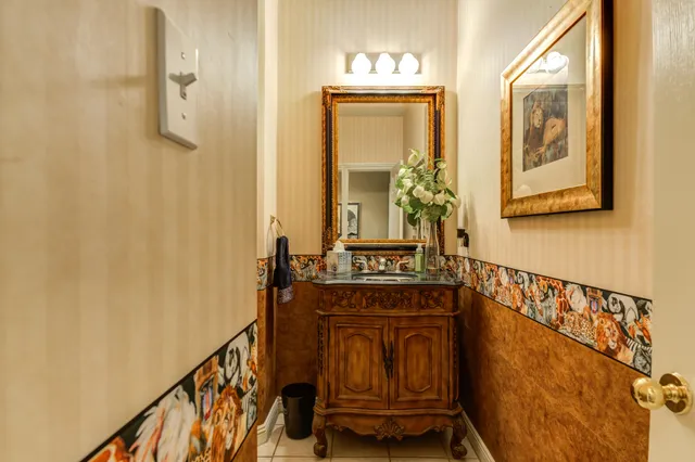 a bedroom with a bed and a book shelf