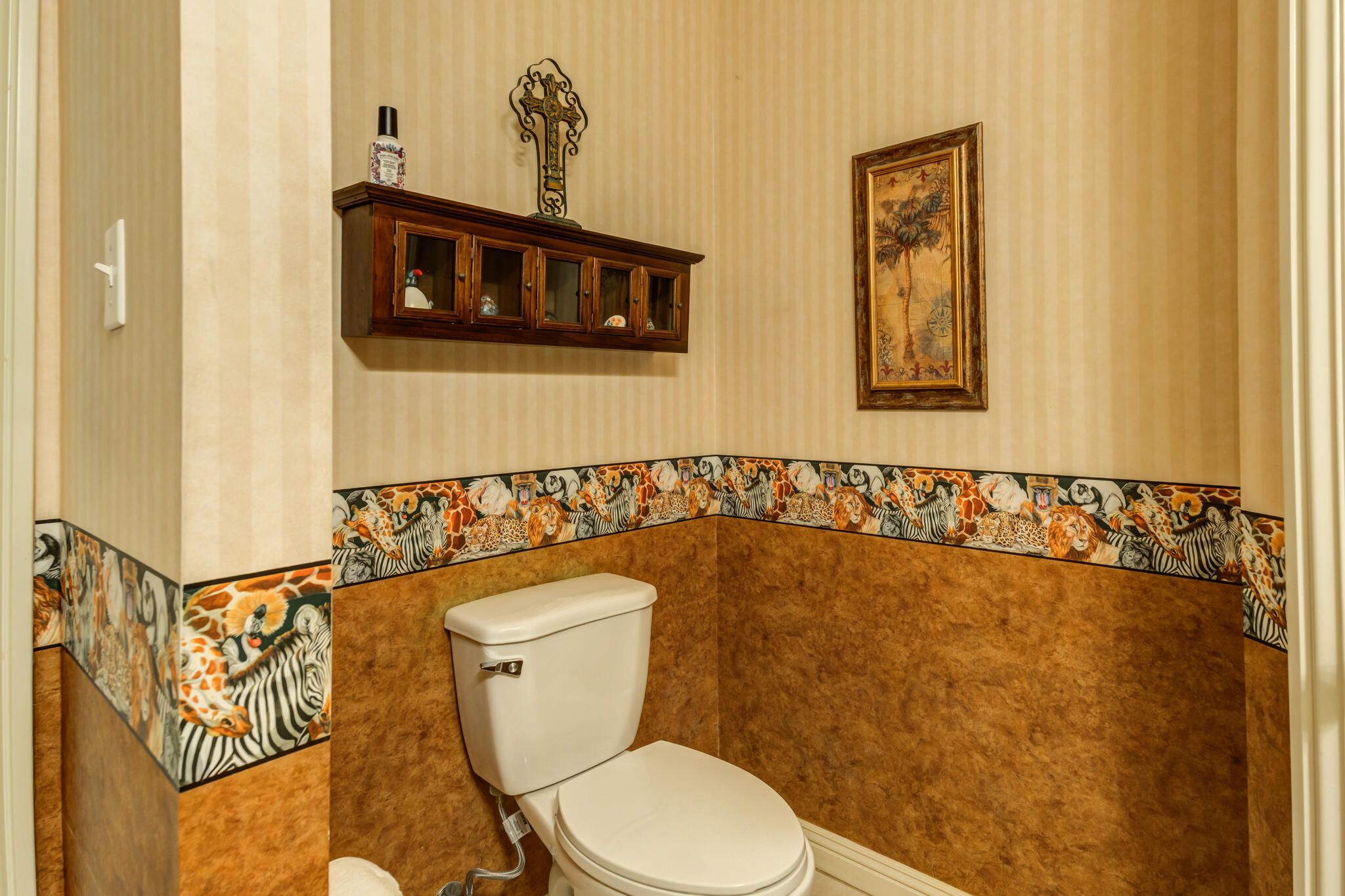 30 West Lakeshore Drive Ransom Canyon, TX 79366 - Photo 27 of 59 a white toilet sitting next to a bathroom sink