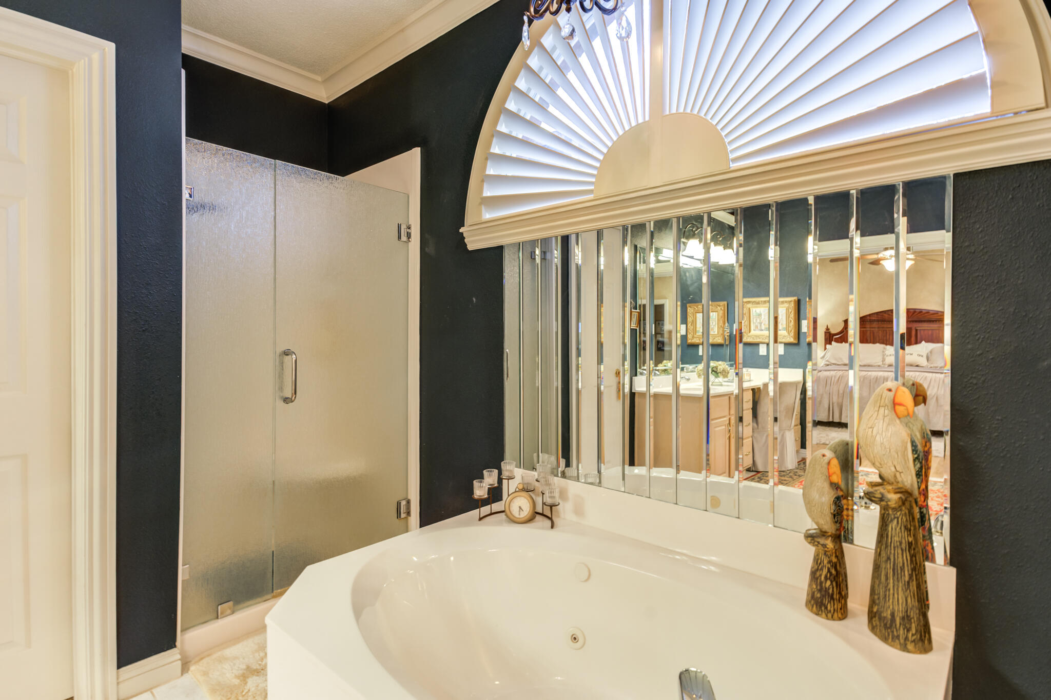 30 West Lakeshore Drive Ransom Canyon, TX 79366 - Photo 38 of 59 a bathroom with a bathtub and a window