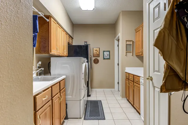 a living room with lots of furniture and a flat screen tv