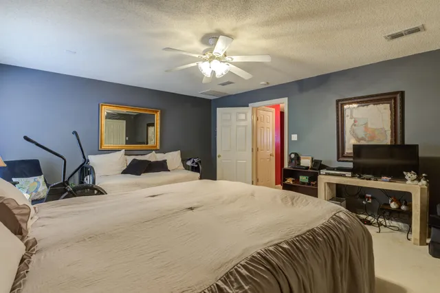 a view of a house with patio area and dining area