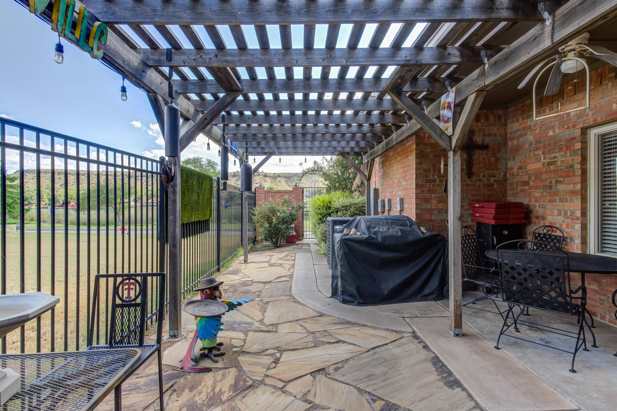 30 West Lakeshore Drive Ransom Canyon, TX 79366 - Photo 53 of 59 a view of a porch with furniture and a yard