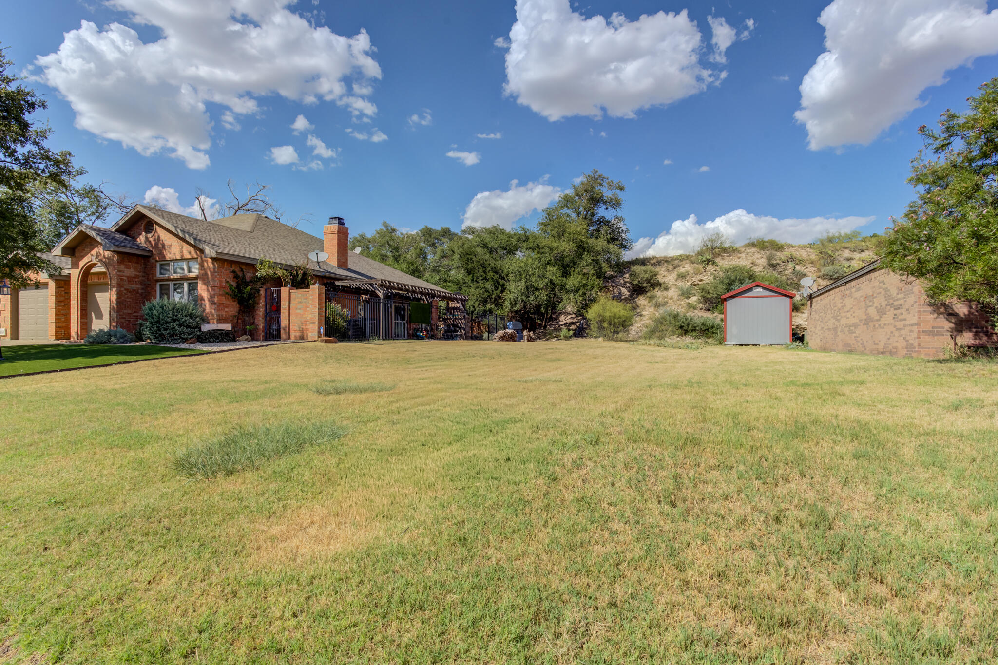 30 West Lakeshore Drive Ransom Canyon, TX 79366 - Photo 58 of 59 a view of a house with a yard