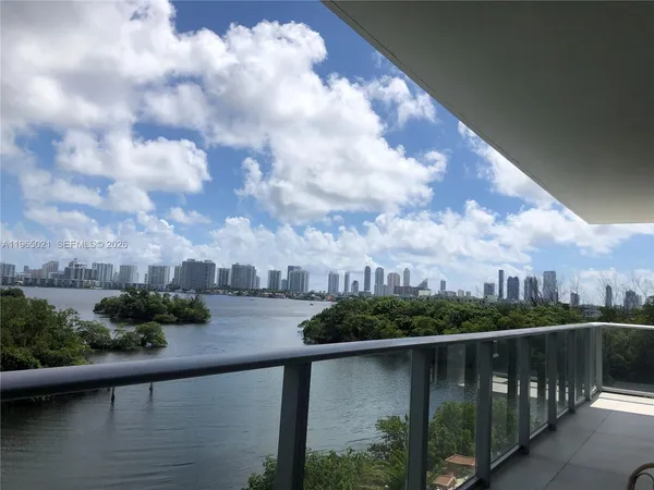 a view of a lake from a balcony