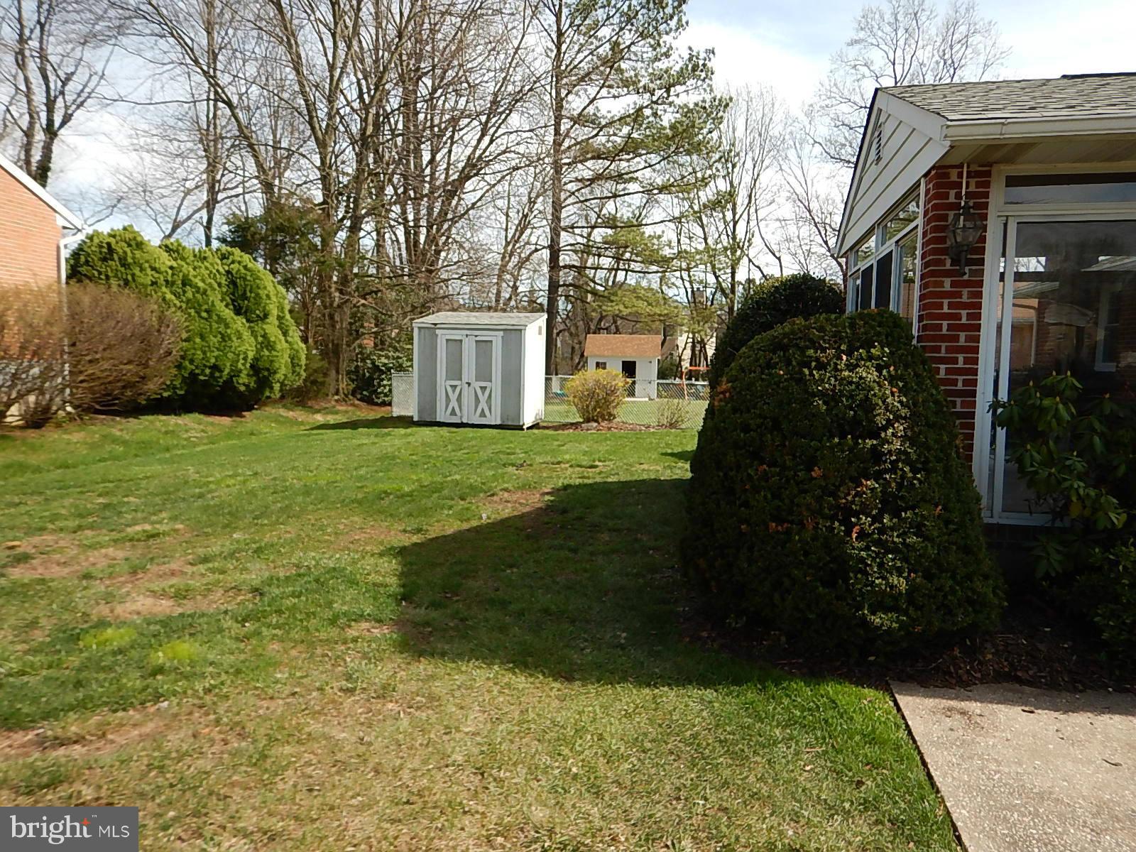 9107 Ramblebrook Road Baltimore, MD 21236 - Photo 3 of 24 Sun Room and Yard