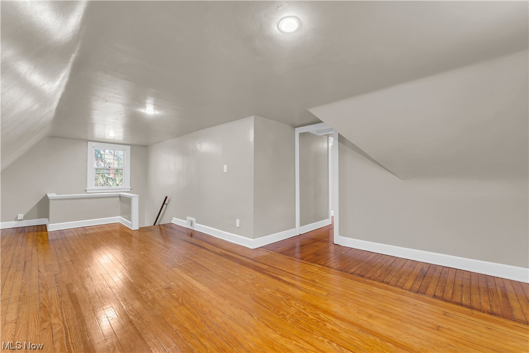 3609 Strandhill Road Shaker Heights, OH 44122 - Photo 17 of 47 Bonus room with wood-type flooring and lofted ceiling