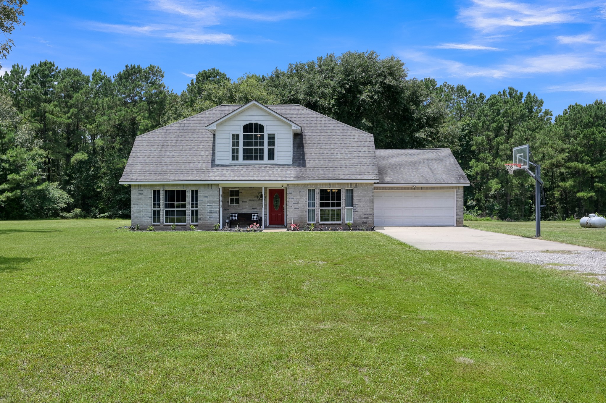 Classic brick exterior with charming front porch