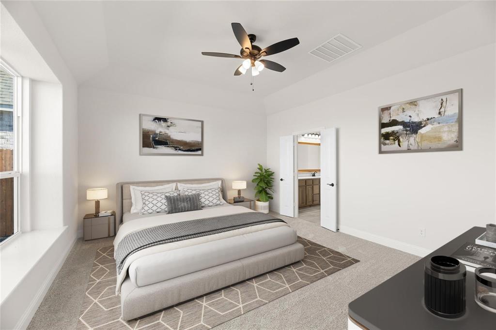 3841 Eagles Bluff Road Midlothian, TX 76065 - Photo 6 of 7 Carpeted bedroom featuring ceiling fan, a tray ceiling, and ensuite bathroom