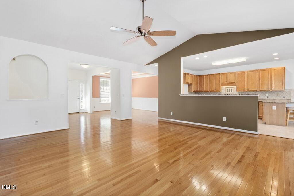4800 Rhythm Drive Apex, NC 27539 - Photo 11 of 32 a view of a livingroom with wooden floor