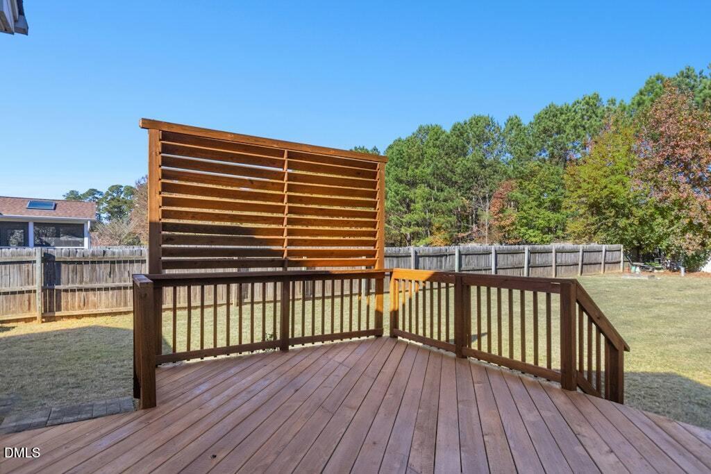 4800 Rhythm Drive Apex, NC 27539 - Photo 25 of 32 a view of balcony with wooden floor and fence