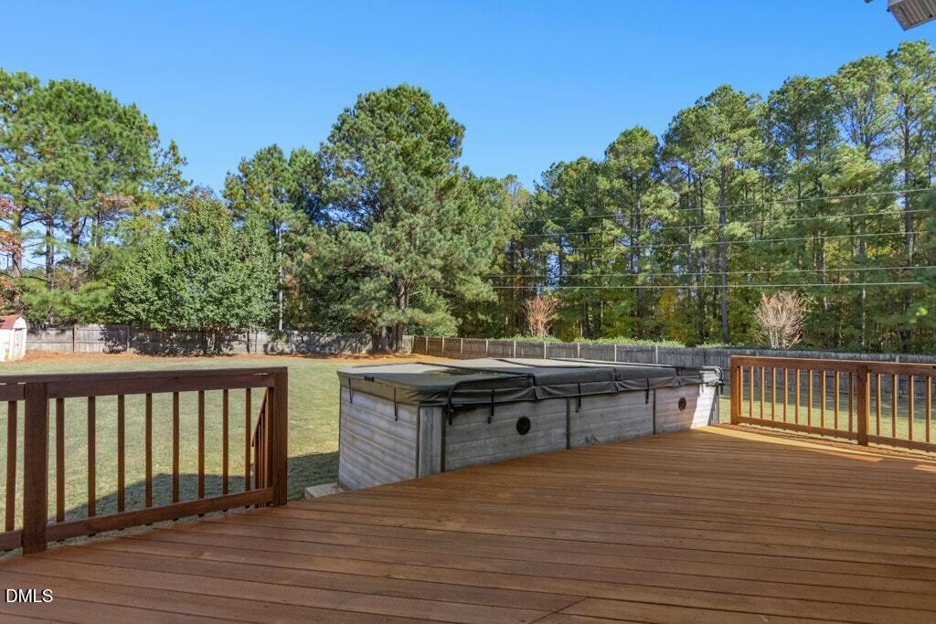 4800 Rhythm Drive Apex, NC 27539 - Photo 26 of 32 a view of balcony with wooden floor and seating space