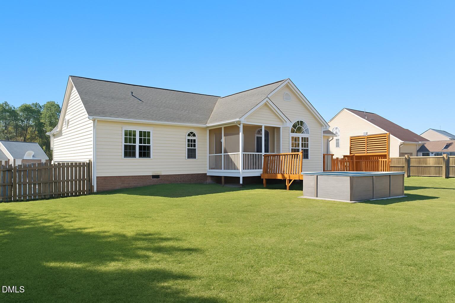 4800 Rhythm Drive Apex, NC 27539 - Photo 29 of 32 a view of a house with a yard and sitting area
