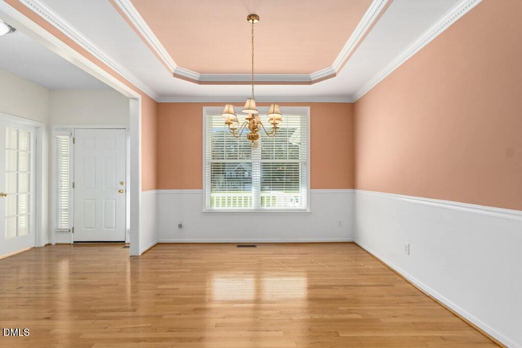 4800 Rhythm Drive Apex, NC 27539 - Photo 5 of 32 a view of an empty room with a window