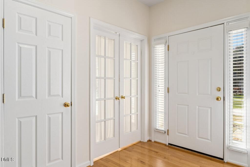 4800 Rhythm Drive Apex, NC 27539 - Photo 6 of 32 a view of a bedroom with a hardwood