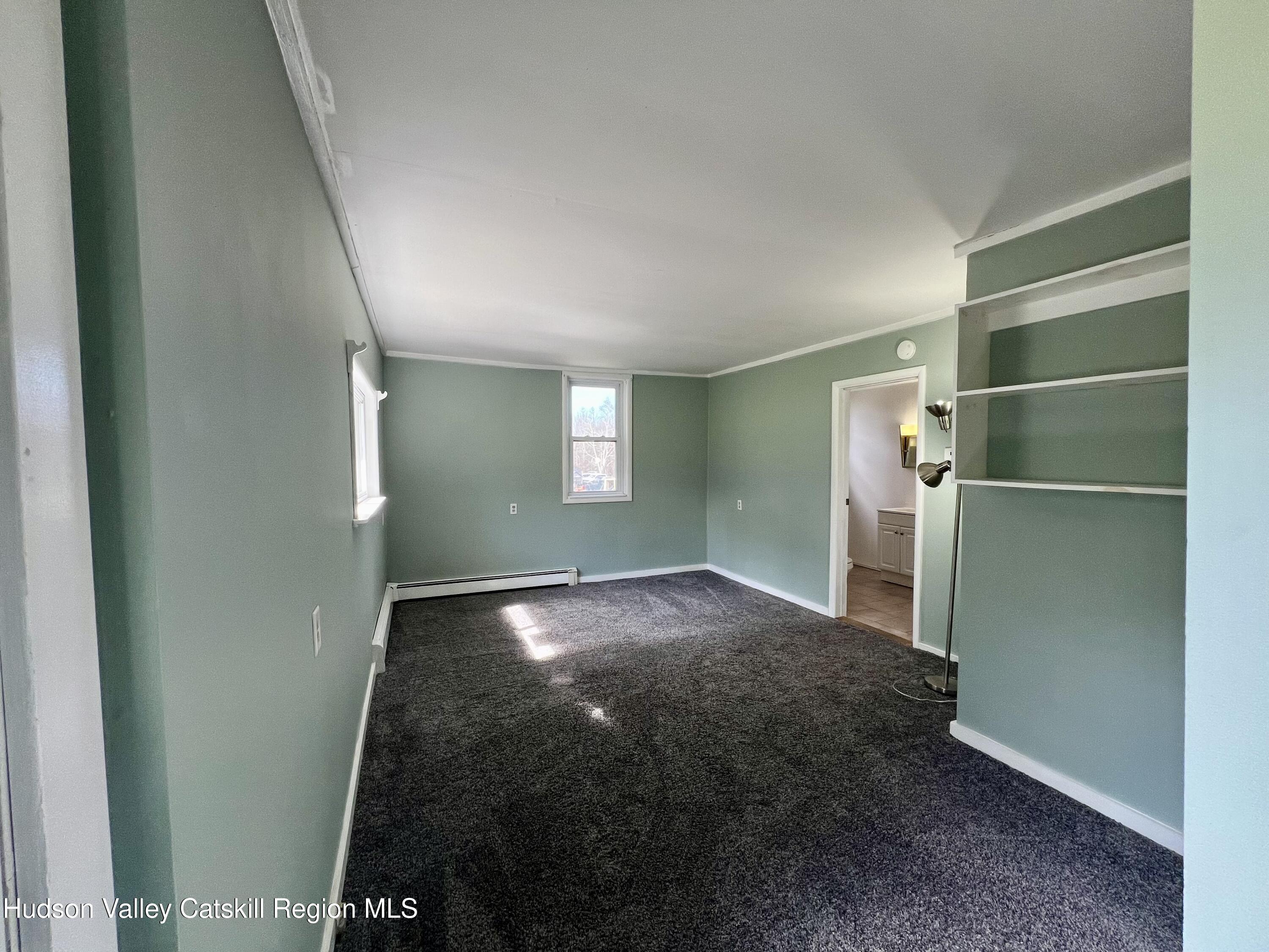 1204 County Rte 9, Unit B Chatham, NY 12037 - Photo 13 of 18 1204 B CR9 bedroom from back door