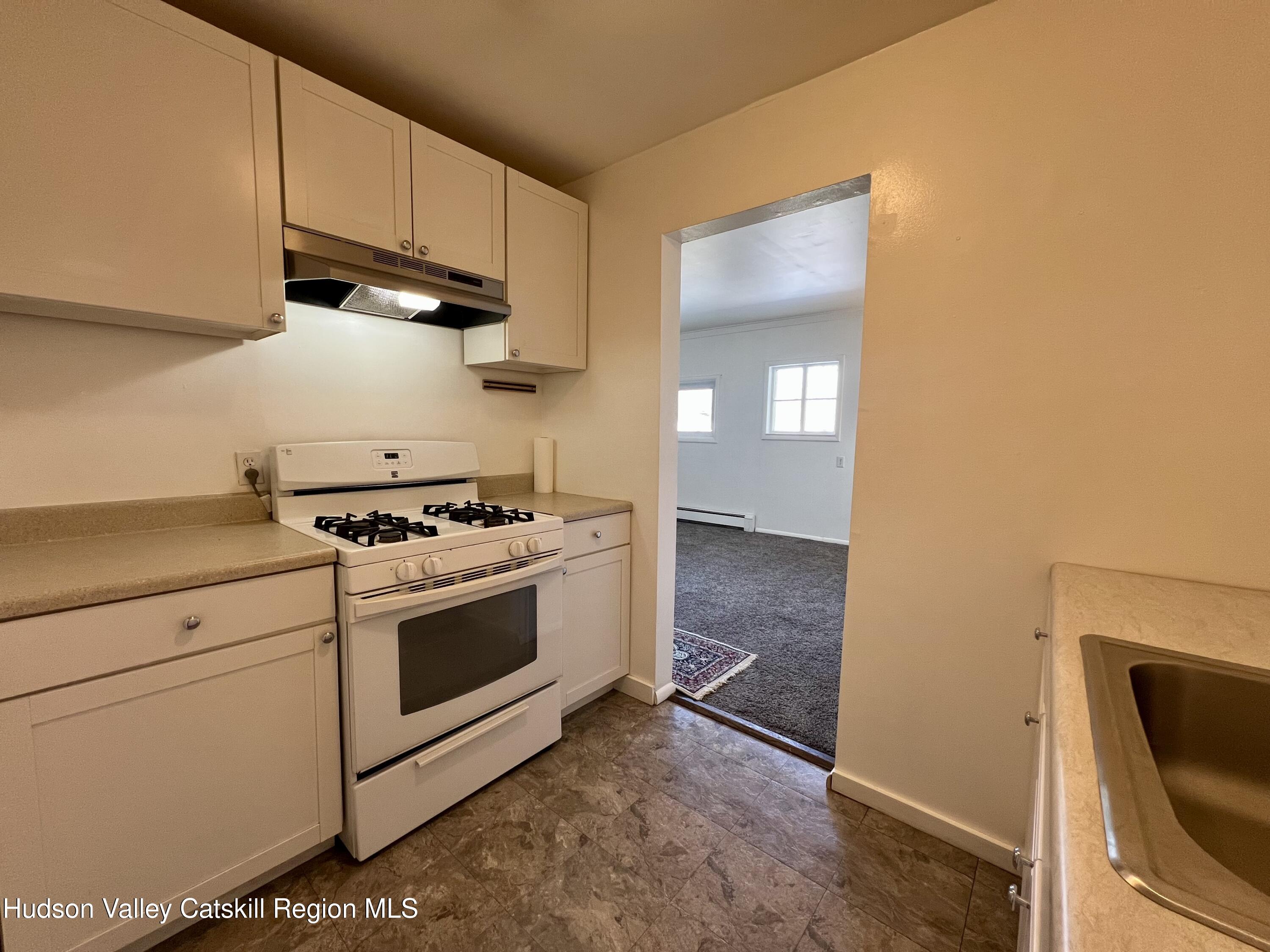 1204 County Rte 9, Unit B Chatham, NY 12037 - Photo 9 of 18 1204 B CR9 Kitchen to LR