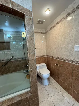 a swimming pool with outdoor seating and lake view