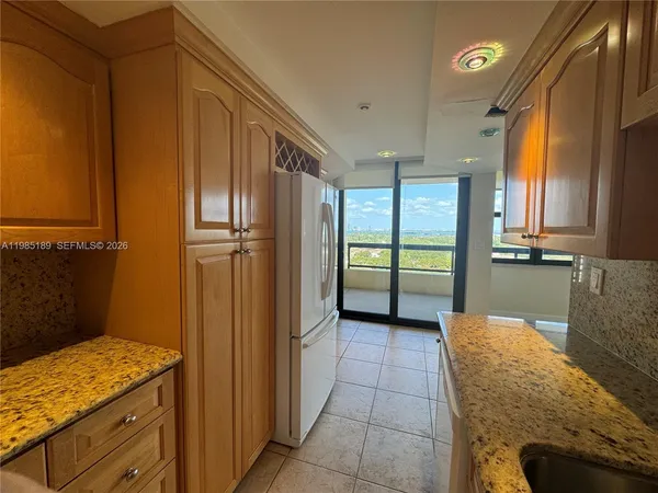an aerial view of residential building and lake view