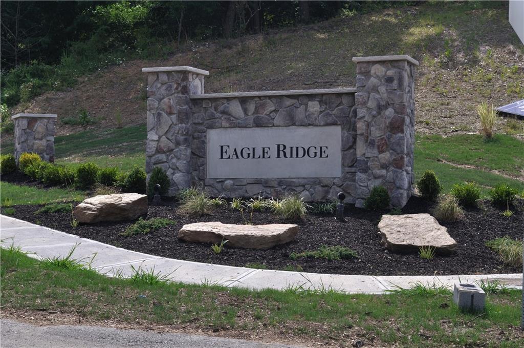 104 Eagle Rdg Road Cranberry Township, PA 16066 - Photo 14 of 18 a sign on the side of the road