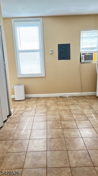321 John Street Harrison, NJ 07029 - Photo 3 of 13 a view of an empty room with window