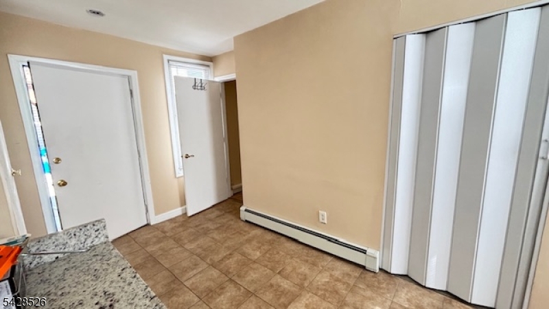 321 John Street Harrison, NJ 07029 - Photo 8 of 13 a view of bedroom and front door