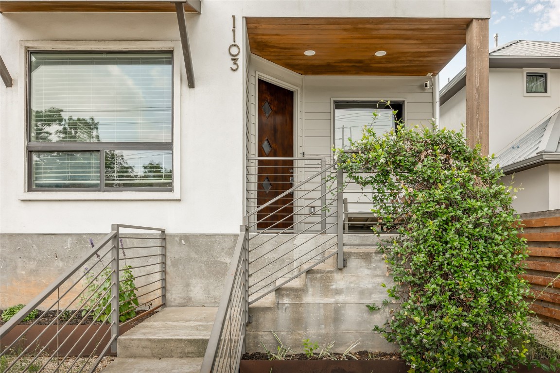 a view of a porch with seating space