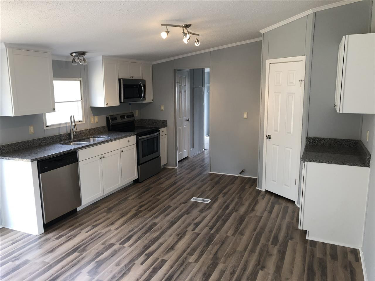 8894 Creek Road Willow Spring, NC 27592 - Photo 11 of 25 Granite Countertops and Cabinets!