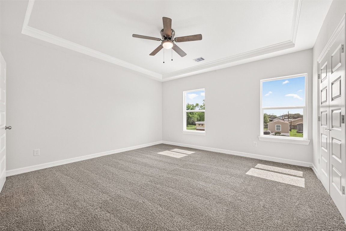 418 North 4th Street Beasley, TX 77417 - Photo 25 of 27 an empty room with windows and fan