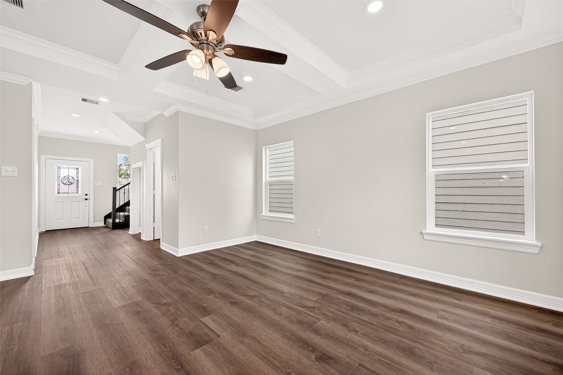 418 North 4th Street Beasley, TX 77417 - Photo 8 of 27 wooden floor in an empty room with a window