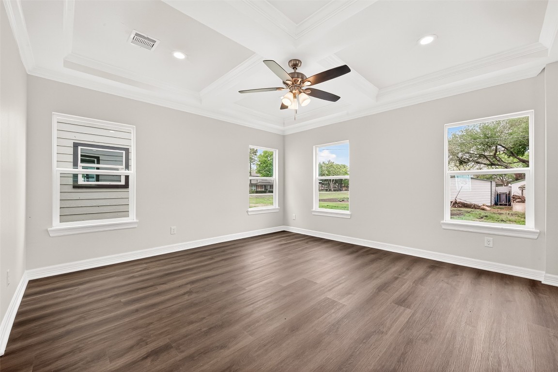 418 North 4th Street Beasley, TX 77417 - Photo 9 of 27 a view of an empty room with wooden floor and a window