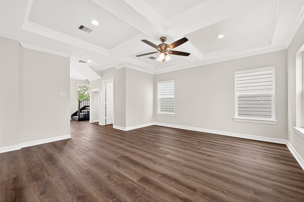418 North 4th Street Beasley, TX 77417 - Photo 10 of 27 a view of an empty room with wooden floor and a window
