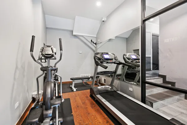 a view of a room with gym equipment