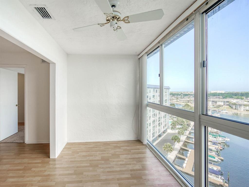4939 Floramar Terrace, Unit 912 New Port Richey, FL 34652 - Photo 22 of 55 a view of an empty room with a window