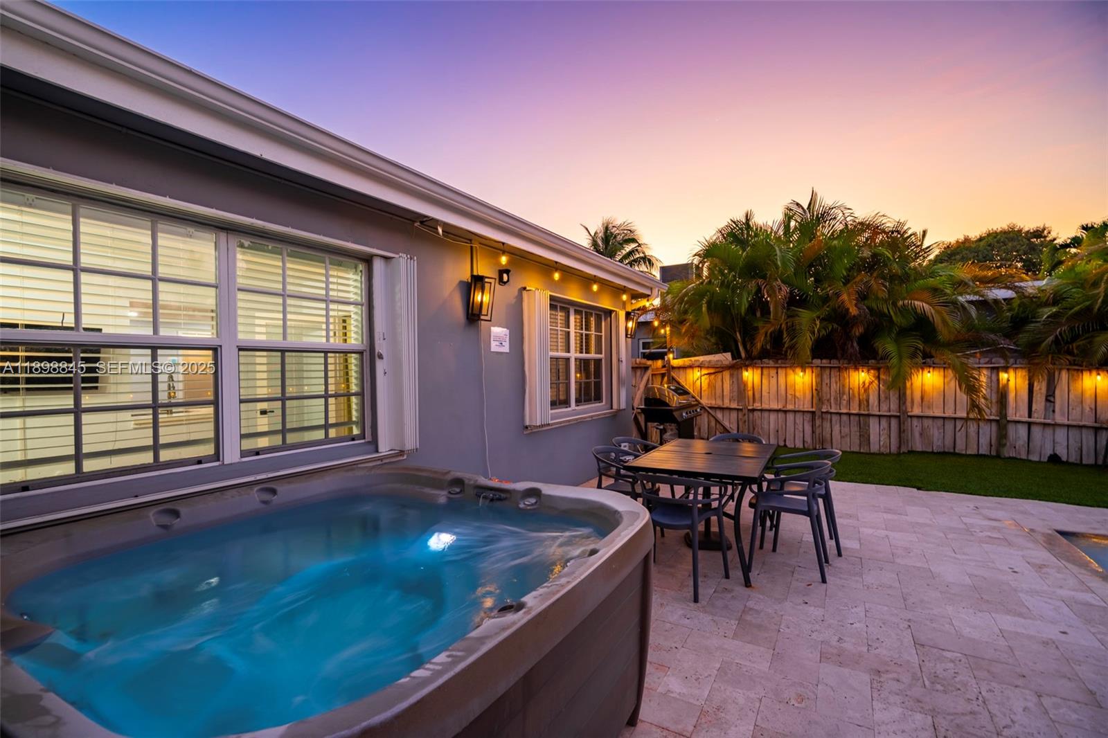 1305 Funston Street Hollywood, FL 33019 - Photo 20 of 93 a view of a house with backyard and sitting area