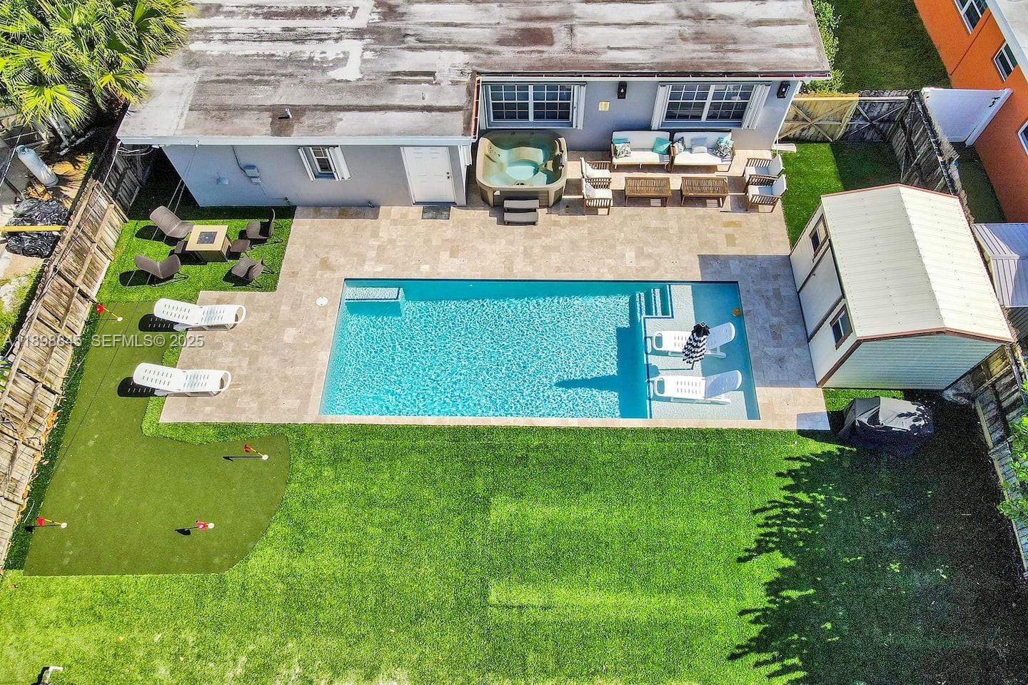 1305 Funston Street Hollywood, FL 33019 - Photo 56 of 93 swimming pool view with a seating space