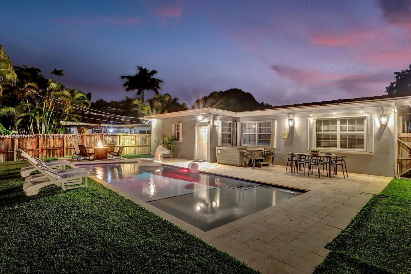 1305 Funston Street Hollywood, FL 33019 - Photo 68 of 93 a view of a house with swimming pool and sitting area