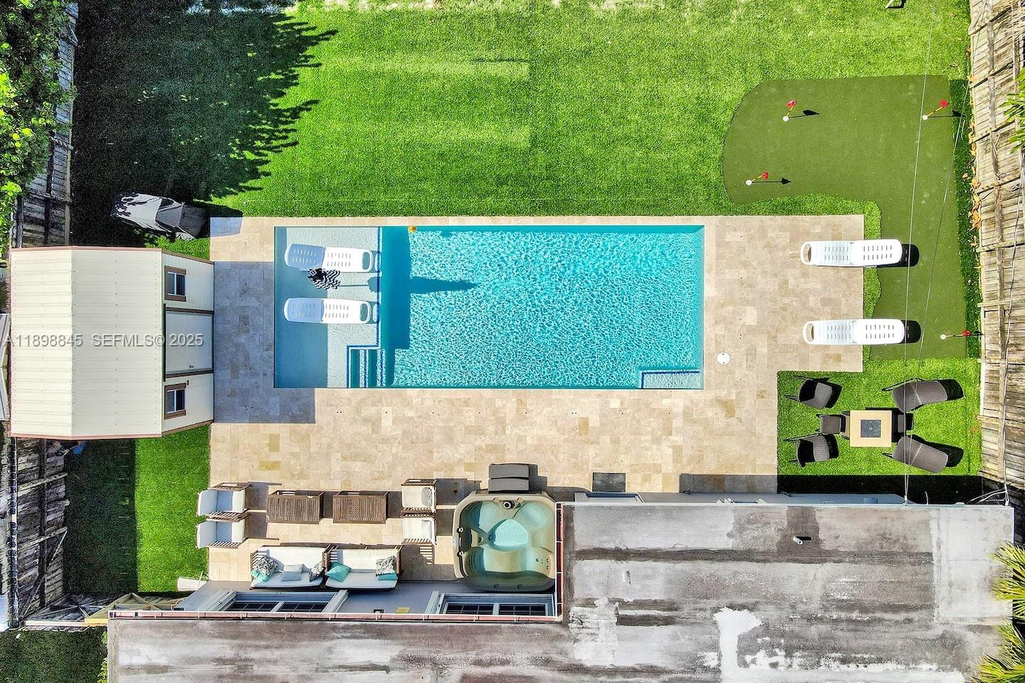 1305 Funston Street Hollywood, FL 33019 - Photo 76 of 93 an aerial view of a house with a garden view