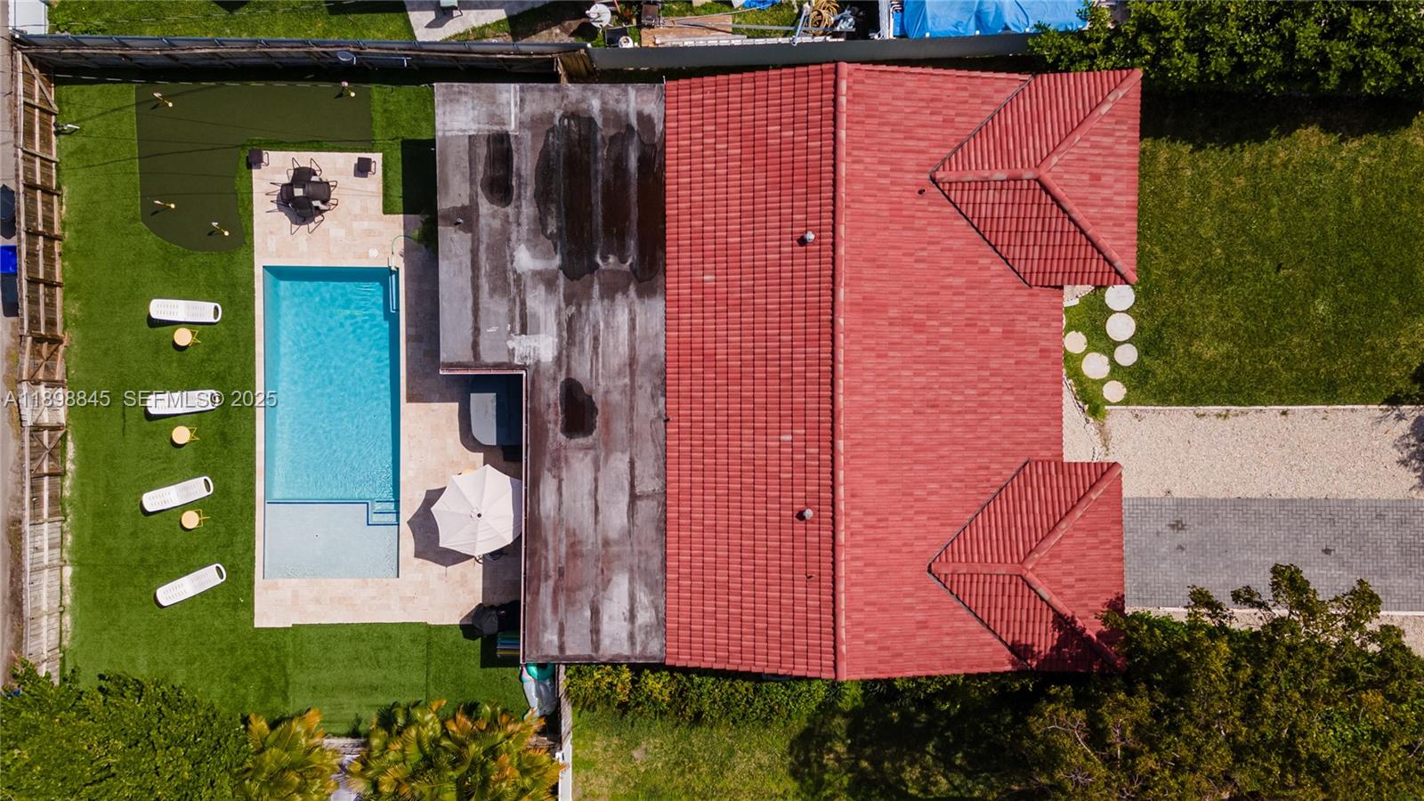 1305 Funston Street Hollywood, FL 33019 - Photo 79 of 93 a view of a house with a yard