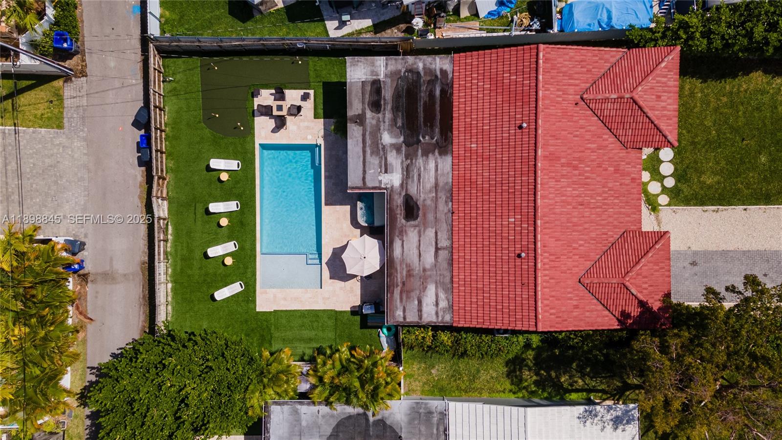 1305 Funston Street Hollywood, FL 33019 - Photo 85 of 93 an aerial view of a house with garden space and street view