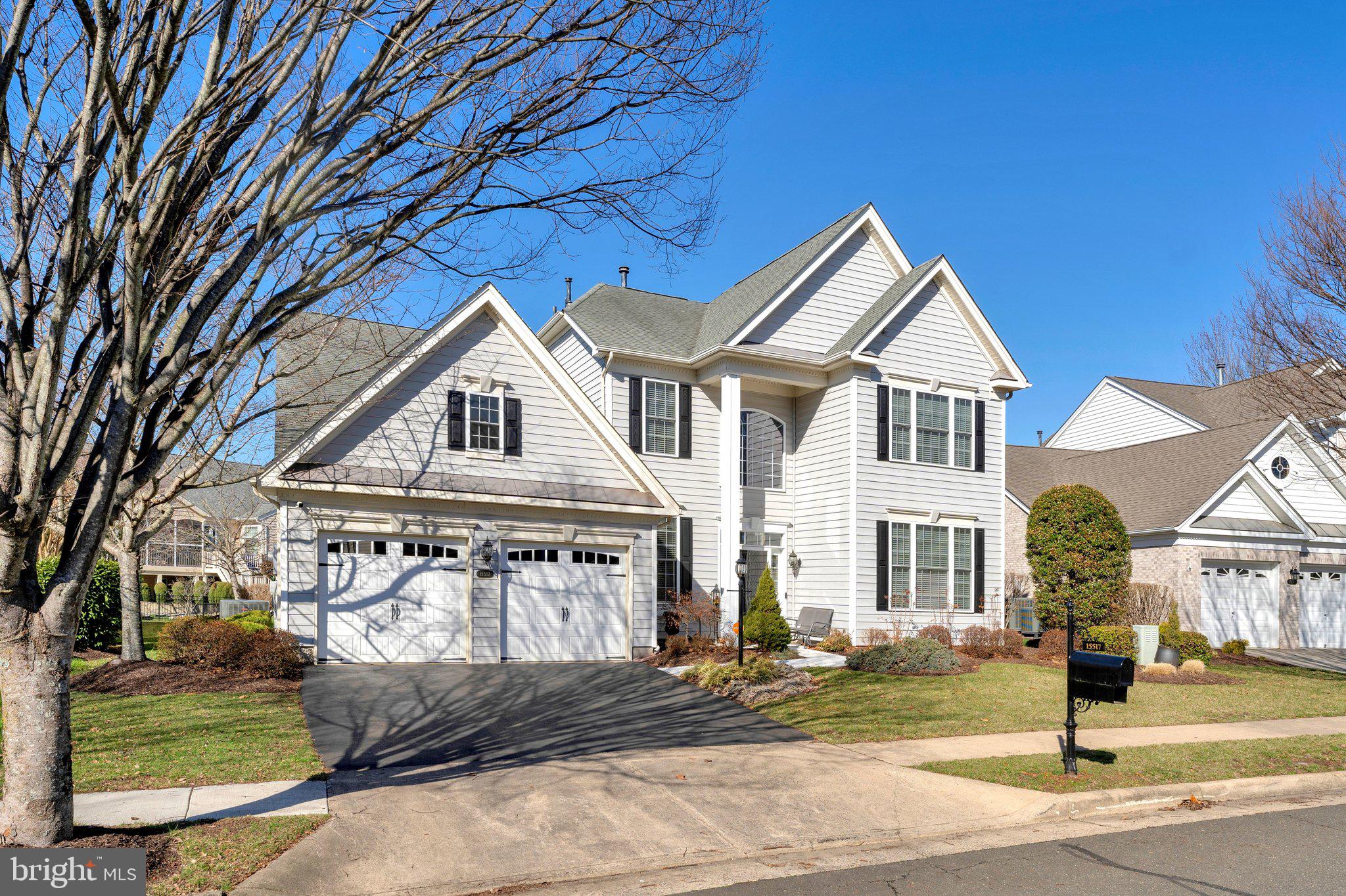 15517 Legacy Way Haymarket, VA 20169 - Photo 1 of 68 a front view of a house with a yard