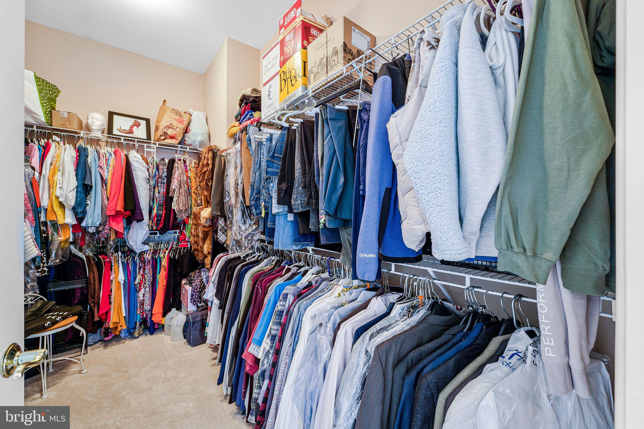 15517 Legacy Way Haymarket, VA 20169 - Photo 31 of 68 a view of walk in closet with clothes