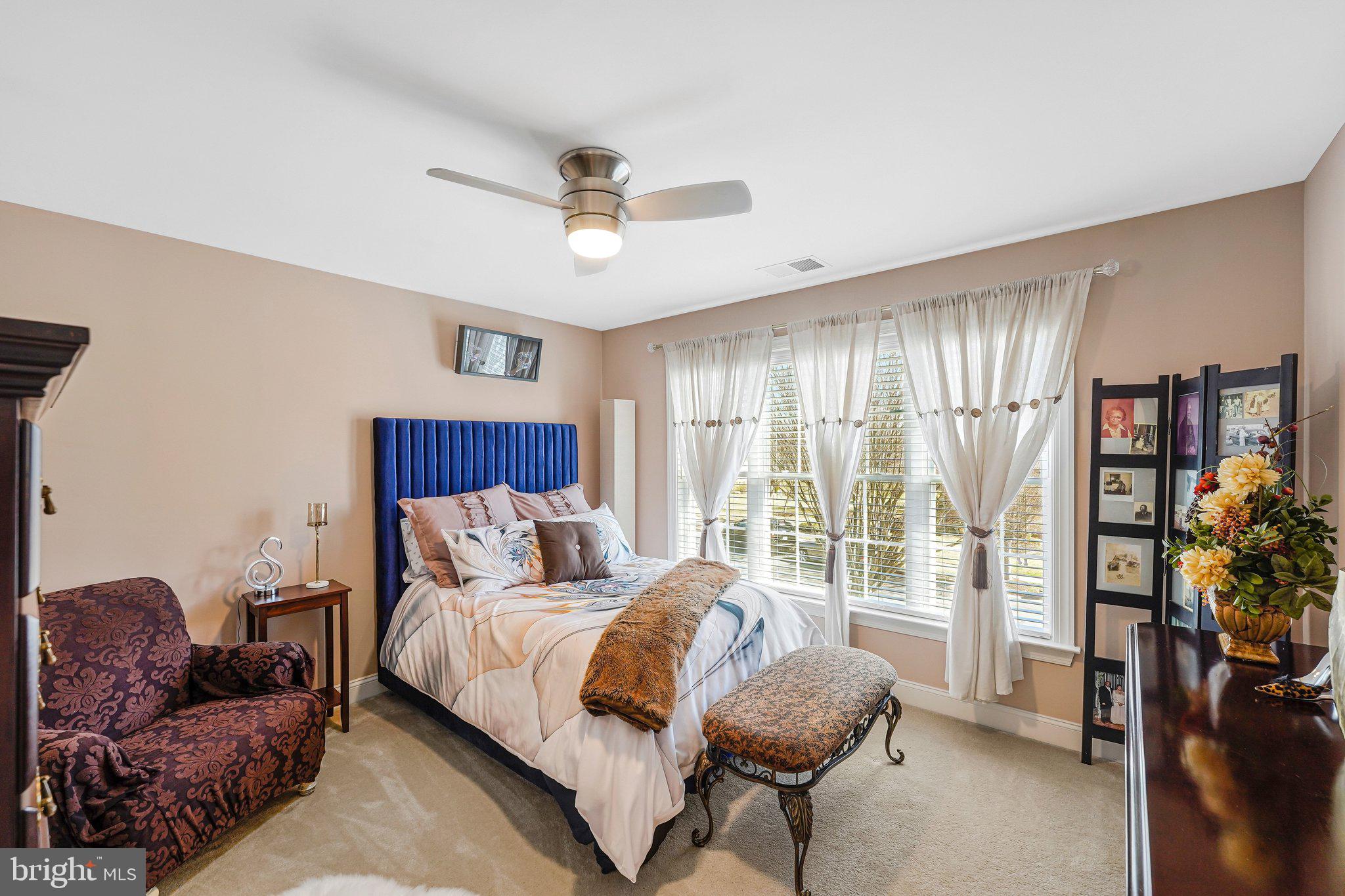 15517 Legacy Way Haymarket, VA 20169 - Photo 34 of 68 a bed room with a bed and a couch