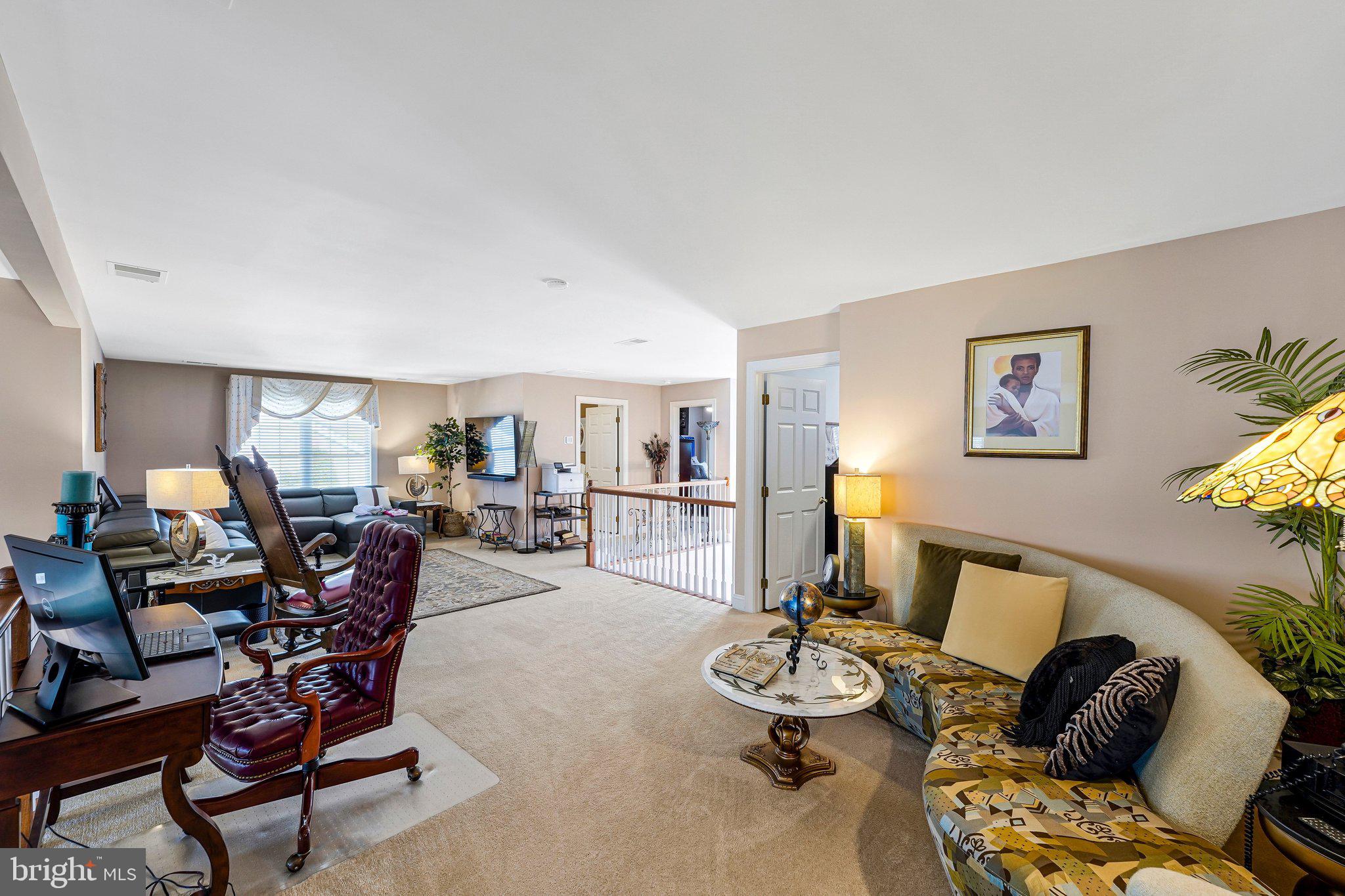 15517 Legacy Way Haymarket, VA 20169 - Photo 38 of 68 a living room with furniture and wooden floor