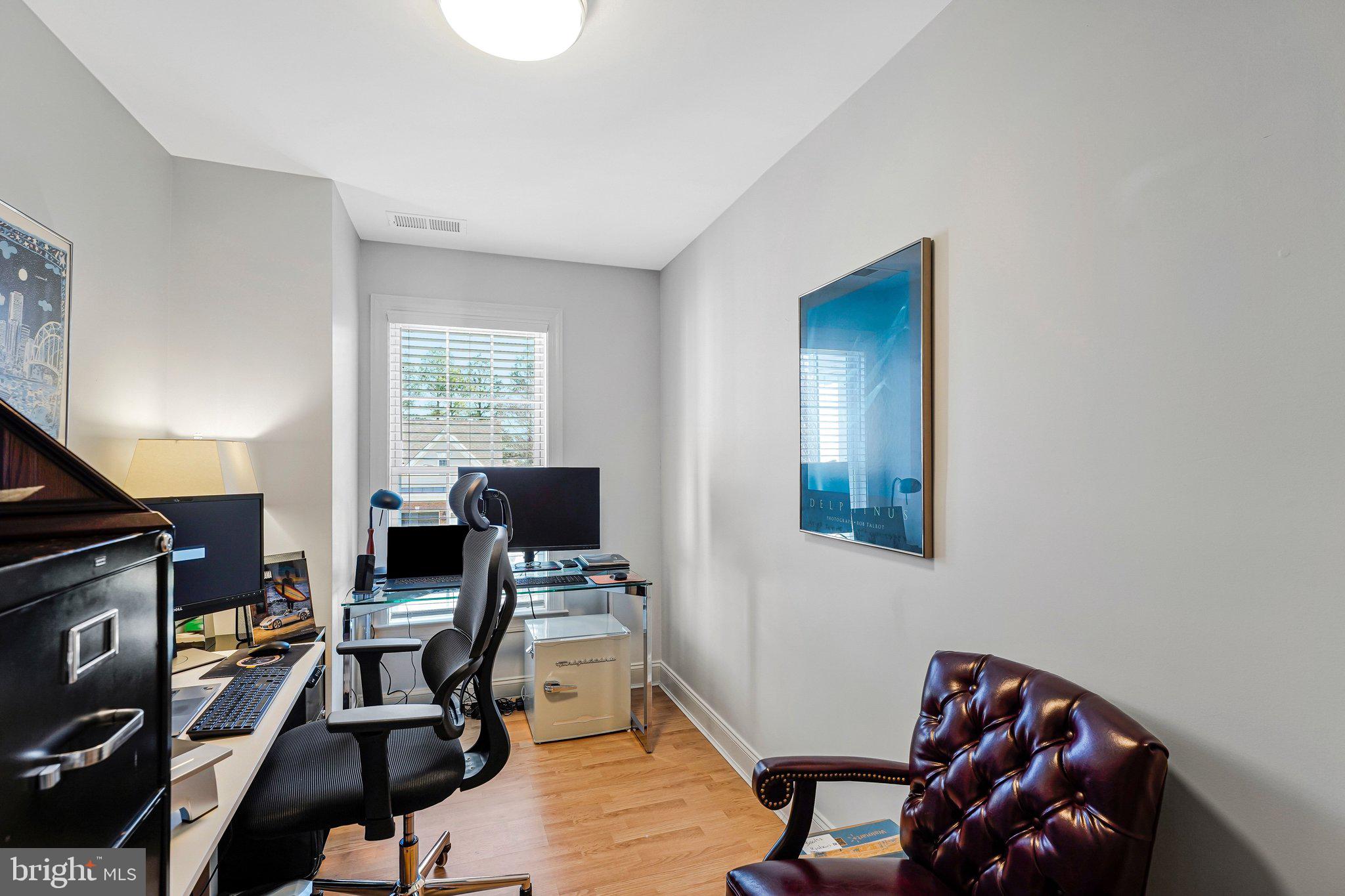 15517 Legacy Way Haymarket, VA 20169 - Photo 42 of 68 a view of a workspace with furniture and a window